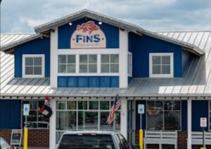 Shucker’s G’town OUT, Fins IN Shucker’s G’town OUT, Fins IN